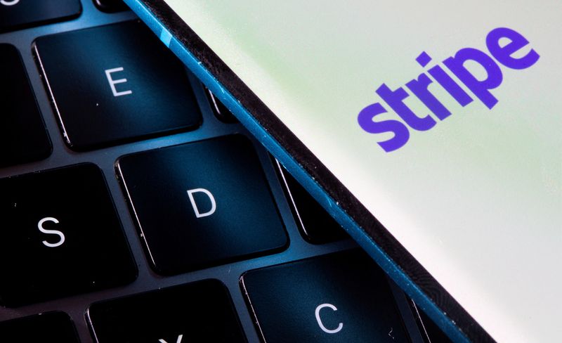 © Reuters. FILE PHOTO: A smartphone with the Stripe logo is placed on a laptop in this illustration taken on July 14, 2021. REUTERS/Dado Ruvic/Illustration/File Photo