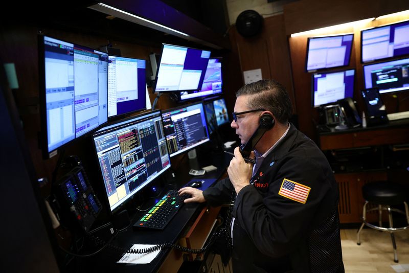 &copy; Reuters. A trader works on the trading floor at the New York Stock Exchange (NYSE) in New York City, U.S., January 26, 2023. REUTERS/Andrew Kelly