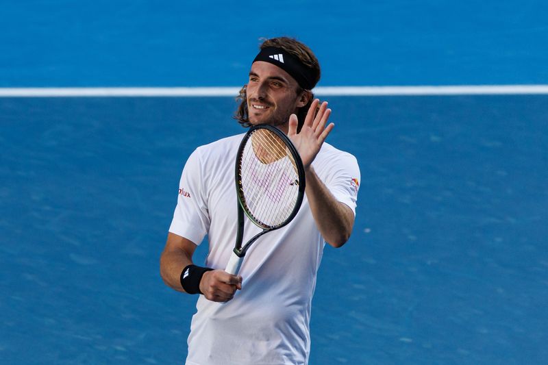 &copy; Reuters. Jan 27, 2023; Melbourne, Victoria, Australia;  Stefanos Tsitsipas of Greece celebrates his victory over Karen Kachanov of Russia after beating him on day twelve of the 2023 Australian Open tennis tournament at Melbourne Park. Mandatory Credit: Mike Frey-U