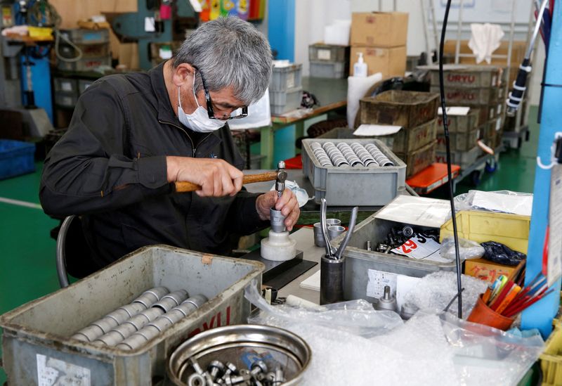 &copy; Reuters. FILE PHOTO: A worker assembles an air drill at the factory of manufacturer Katsui Kogyo in Higashiosaka, Japan June 23, 2022.  REUTERS/Sakura Murakami/File Photo