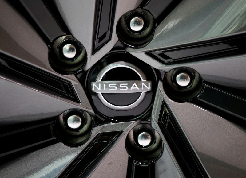 &copy; Reuters. FILE PHOTO: The brand logo of Nissan Motor Corp. is seen on a tyre wheel of the company's car at their showroom in Tokyo, Japan November 11, 2020.  REUTERS/Issei Kato/File Photo/File Photo