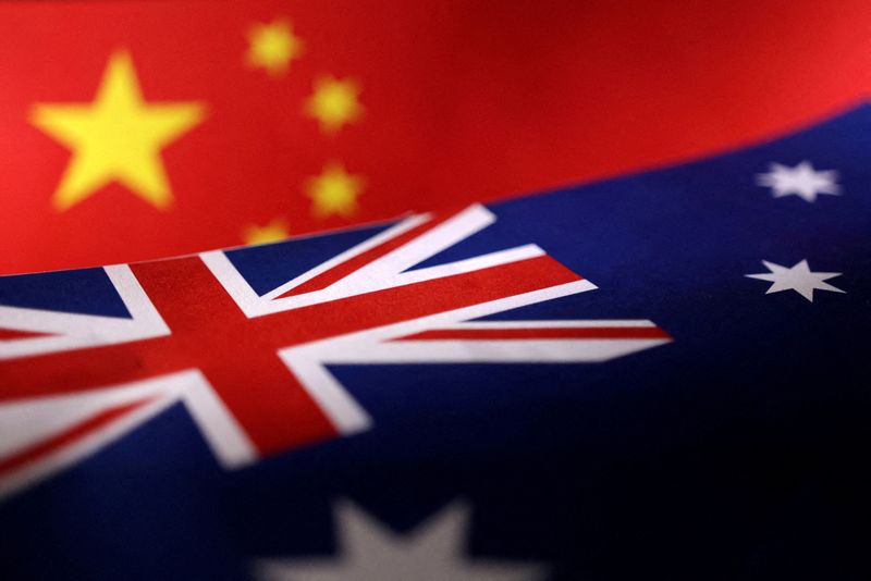 &copy; Reuters. FILE PHOTO: Printed Chinese and Australian flags are seen in this illustration, July 21, 2022. REUTERS/Dado Ruvic/Illustration/File Photo