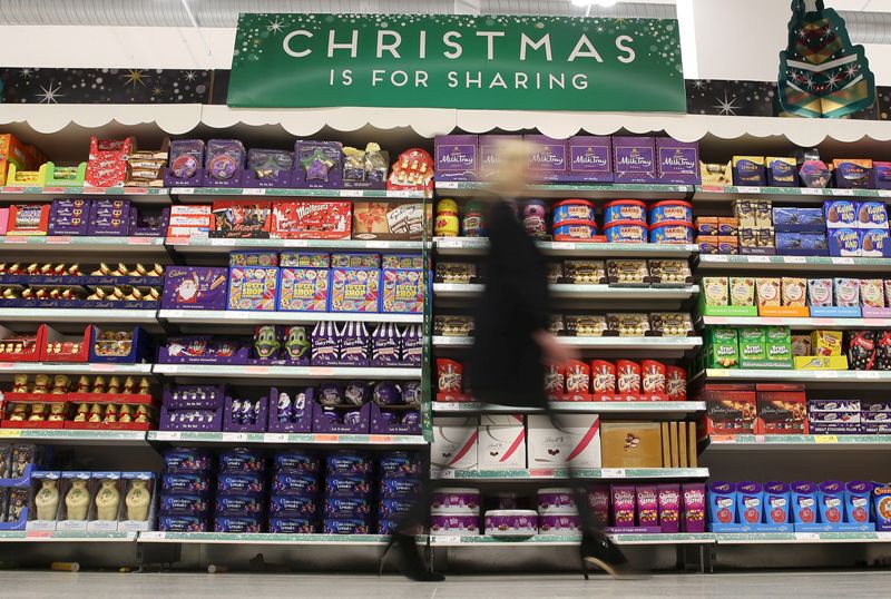 &copy; Reuters. FILE PHOTO: A woman shops at a Sainsbury's store in London, Britain December 3, 2015. REUTERS/Neil Hall