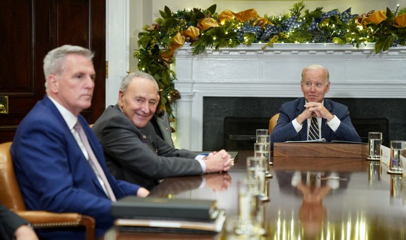 &copy; Reuters. FILE PHOTO: U.S. President Joe Biden looks toward House Republican leader Kevin McCarthy and Senate Majority Leader Chuck Schumer, during a meeting with congressional leaders at the White House in Washington, U.S., November 29, 2022. REUTERS/Kevin Lamarqu