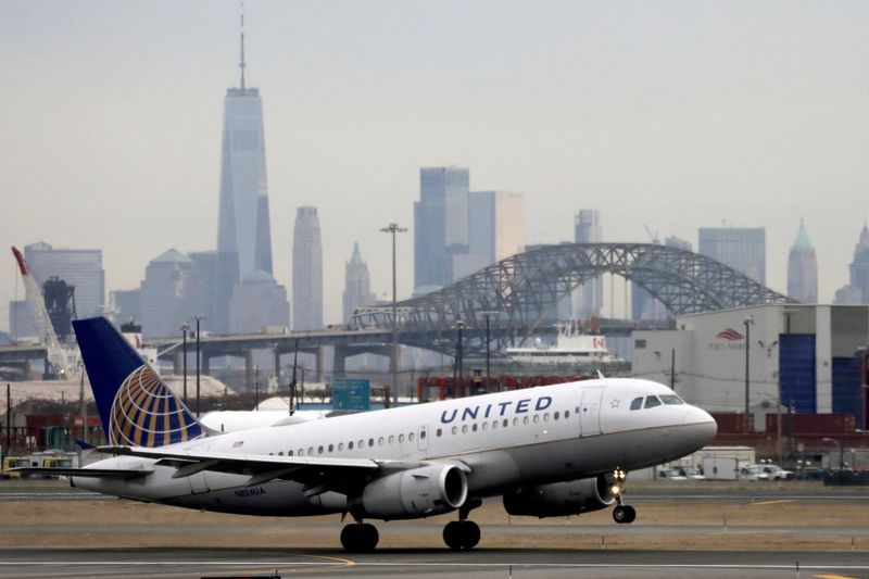 &copy; Reuters. FILE PHOTO: A United Airlines passenger jet takes off with New York City as a backdrop, at Newark Liberty International Airport, New Jersey, U.S. December 6, 2019. REUTERS/Chris Helgren//File Photo