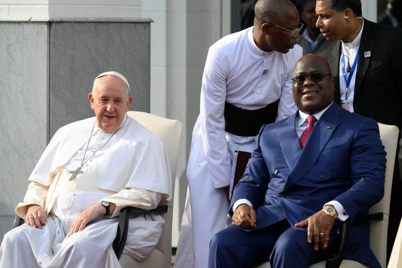 &copy; Reuters. Pope Francis sits next to Democratic Republic of Congo's President Felix Tshisekedi as he attends the welcoming ceremony at the Palais de la Nation on the first day of his apostolic journey, in Kinshasa, Democratic Republic of Congo, January 31, 2023. Sim