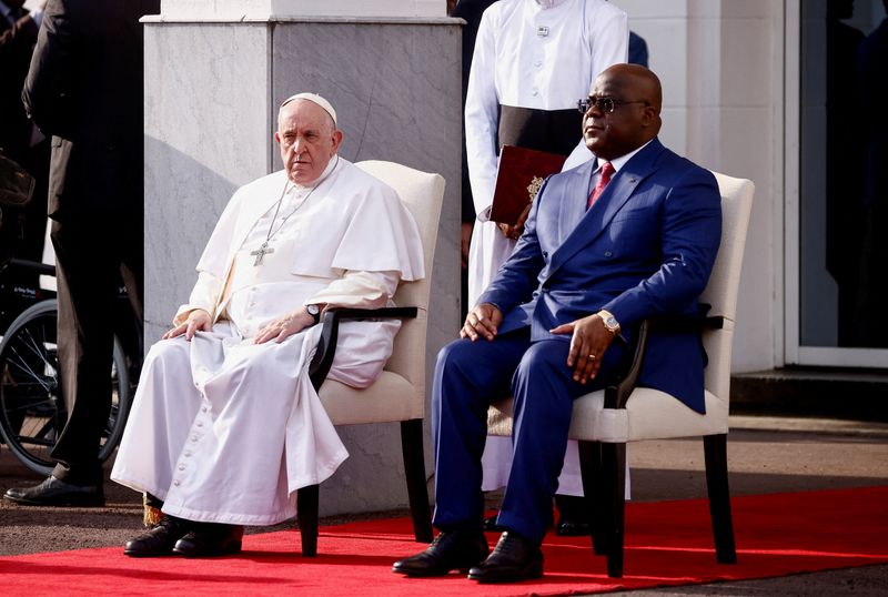 &copy; Reuters. Pope Francis sits next to Democratic Republic of Congo's President Felix Tshisekedi as he attends the welcoming ceremony at the Palais de la Nation on the first day of his apostolic journey, in Kinshasa, Democratic Republic of Congo, January 31, 2023. REU