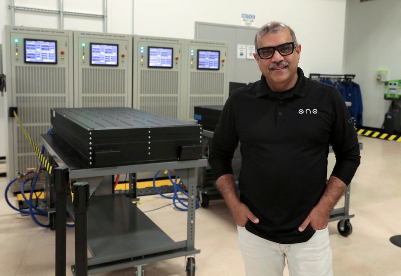 © Reuters. FILE PHOTO: Our Next Energy (ONE) CEO Mujeeb Ijaz stands next to Aries lithium iron phosphate battery packs waiting to undergo testing at ONE's headquarters in Novi, Michigan, U.S., April 25, 2022. REUTERS/ Rebecca Cook