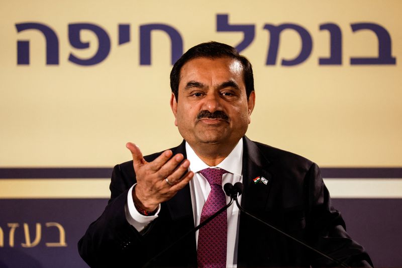 &copy; Reuters. FILE PHOTO: Indian billionaire Gautam Adani speaks during an inauguration ceremony after the Adani Group completed the purchase of Haifa Port earlier in January 2023, in Haifa port, Israel January 31, 2023. REUTERS/Amir Cohen/File Photo
