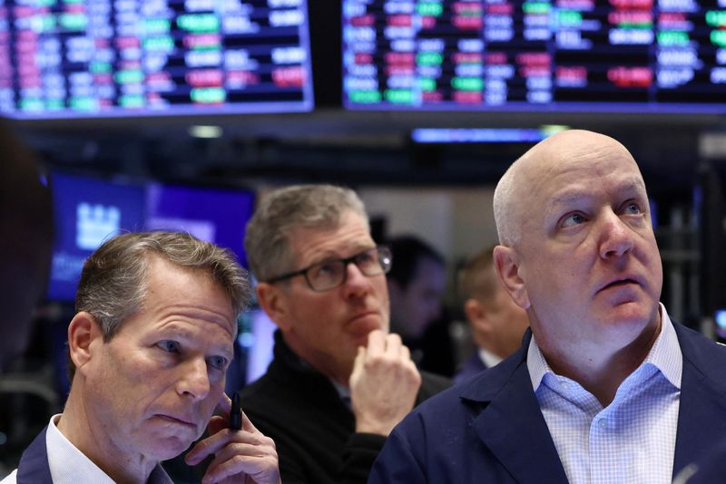 &copy; Reuters. FILE PHOTO: Traders work on the trading floor at the New York Stock Exchange (NYSE) in New York City, U.S., January 27, 2023. REUTERS/Andrew Kelly