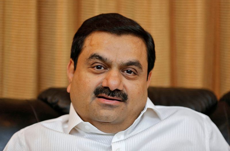© Reuters. FILE PHOTO: Indian billionaire Gautam Adani speaks during an interview with Reuters at his office in the western Indian city of Ahmedabad April 2, 2014.    REUTERS/Amit Dave