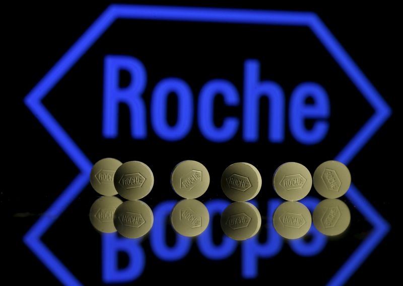 &copy; Reuters. Roche tablets are seen positioned in front of a displayed Roche logo in this photo illustration shot January 22, 2016.   REUTERS/Dado Ruvic/Illustration/Files