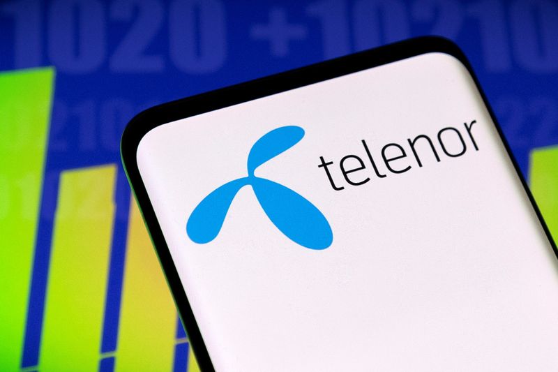 &copy; Reuters. Telenor logo and stock graph are seen displayed in this illustration taken, May 3, 2022. REUTERS/Dado Ruvic/Illustration/Files