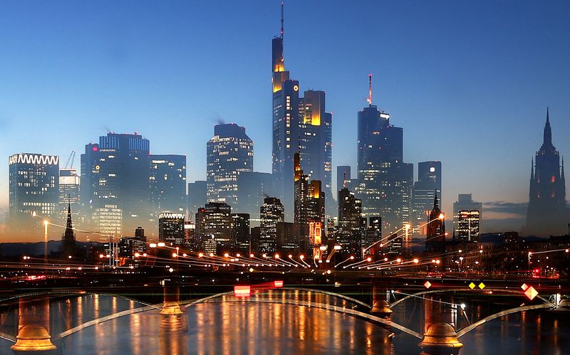 &copy; Reuters. FILE PHOTO: The skyline with its financial district is seen double, in Frankfurt, Germany, February 11, 2021. Picture taken on long-time exposure while zoomed.  REUTERS/Kai Pfaffenbach