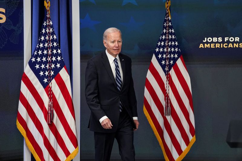 Biden hails January jobs report, waves off inflation question