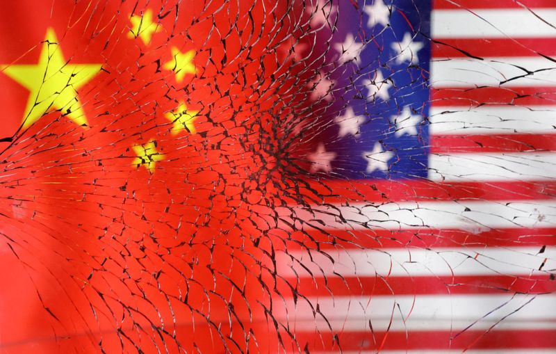 &copy; Reuters. U.S. and Chinese flags are seen through broken glass in this illustration taken, January 30, 2023. REUTERS/Dado Ruvic/Illustration