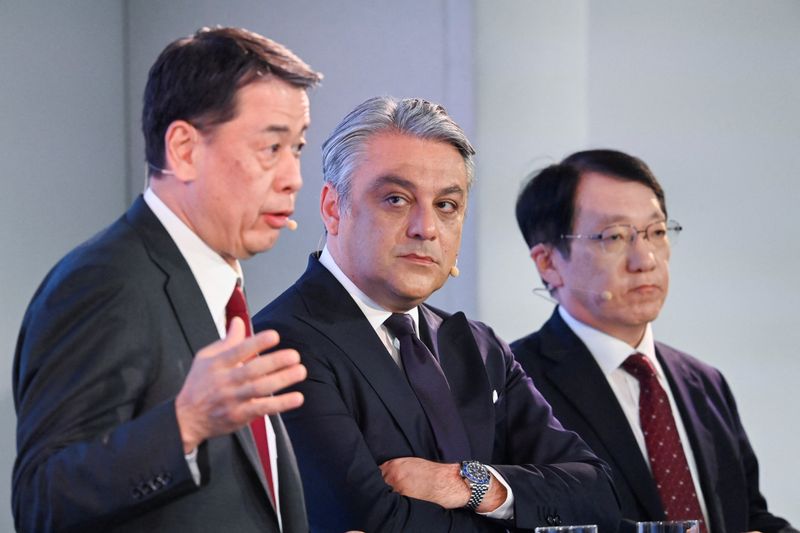 &copy; Reuters. FILE PHOTO: CEO of Nissan Makoto Uchida, CEO of Renault Luca De Meo and CEO of Mitsubishi Takao Kato attend a news conference to unveil new agreement between Nissan and Renault in London, Britain February 6, 2023. REUTERS/Toby Melville