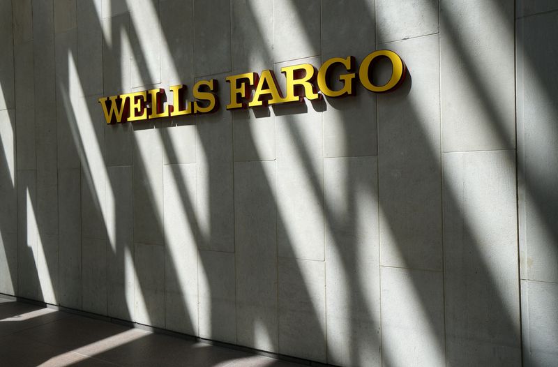 &copy; Reuters. FILE PHOTO: The sign outside the Wells Fargo & Co. bank in downtown Denver April 13, 2016.  REUTERS/Rick Wilking