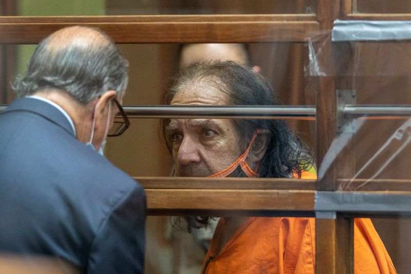 &copy; Reuters. FILE PHOTO: Adult film star Ron Jeremy, whose real name is Ronald Jeremy Hyatt in talks with his attorney Stuart Goldfarb during an arraignment hearing at Clara Shortridge Foltz Criminal Justice Center in Los Angeles, California, U.S., June 26, 2020. 