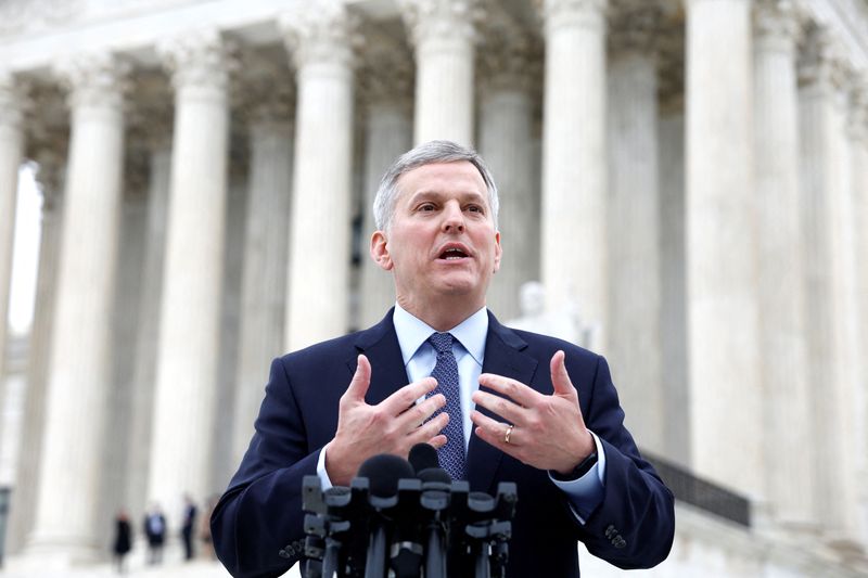 © Reuters. FILE PHOTO: North Carolina Attorney General Josh Stein speaks to the media outside of the United States Supreme Court following oral arguments in Moore v. Harper, a Republican-backed appeal to curb judicial oversight of elections, in Washington, U.S., December 7, 2022. REUTERS/Evelyn Hockstein