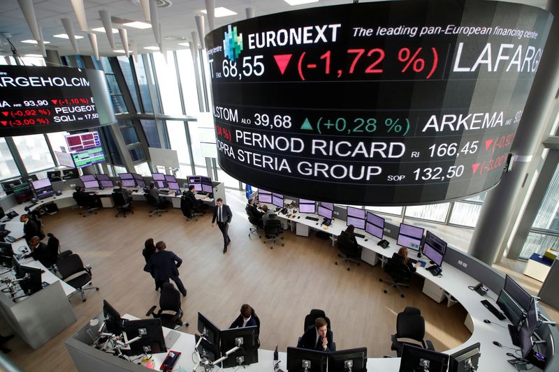 &copy; Reuters. FILE PHOTO: Stock market operator Euronext's universal analysts work in the market services surveillance room center at the Euronext headquarters at La Defense business and financial district in Courbevoie near Paris, France, November 21, 2019. REUTERS/Ch