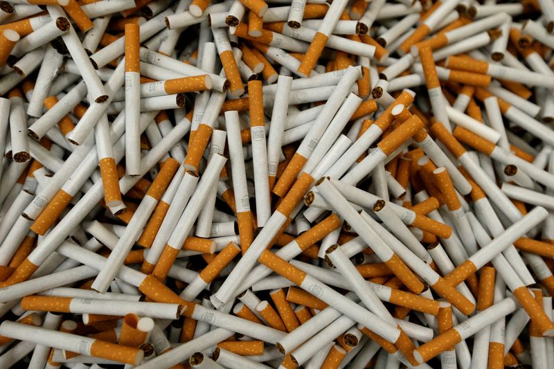 © Reuters. FILE PHOTO: Lucky Strike cigarettes are seen during the manufacturing process in the British American Tobacco Cigarette Factory (BAT) in Bayreuth, Germany, April 30, 2014. REUTERS/Michaela Rehle/File Photo