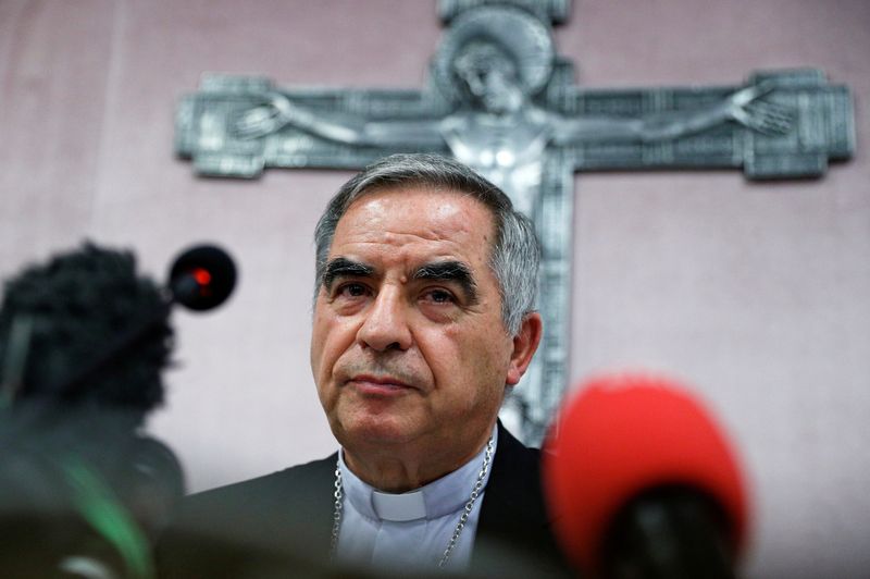 &copy; Reuters. FILE PHOTO: Cardinal Giovanni Angelo Becciu, who has been caught up in a real estate scandal, pauses as he speaks to the media a day after he resigned suddenly and gave up his right to take part in an eventual conclave to elect a pope, near the Vatican, i