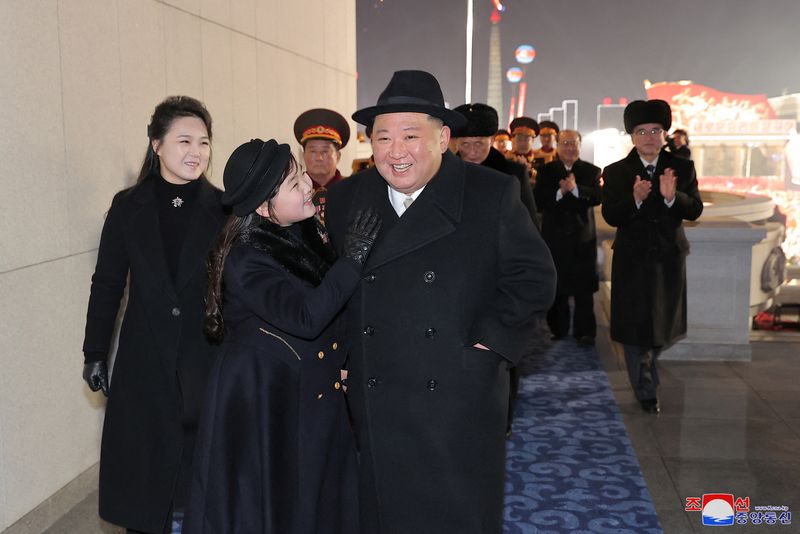 &copy; Reuters. North Korean leader Kim Jong Un, his wife Ri Sol Ju and their daughter Kim Ju Ae attend a military parade to mark the 75th founding anniversary of North Korea's army, at Kim Il Sung Square in Pyongyang, North Korea February 8, 2023, in this photo released