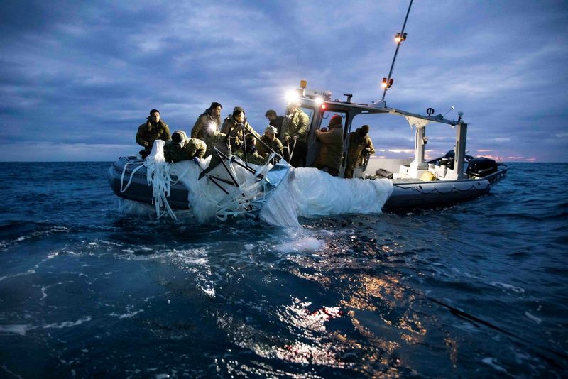 &copy; Reuters. FILE PHOTO: Sailors assigned to Explosive Ordnance Disposal Group 2 recover a suspected Chinese high-altitude surveillance balloon that was downed by the United States over the weekend over U.S. territorial waters off the coast of Myrtle Beach, South Caro