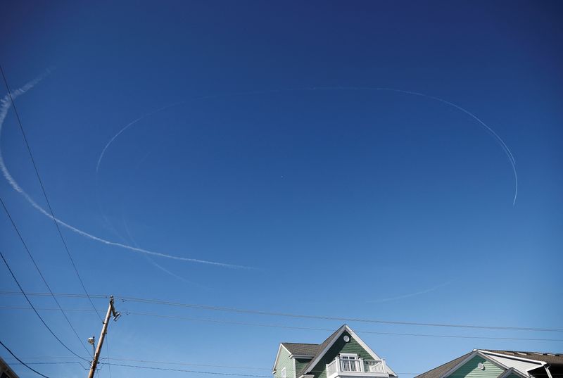 &copy; Reuters. FILE PHOTO: Contrails from jets circle a suspected Chinese spy balloon as it floats off the coast in Surfside Beach, South Carolina, U.S. February 4, 2023.  REUTERS/Randall Hill