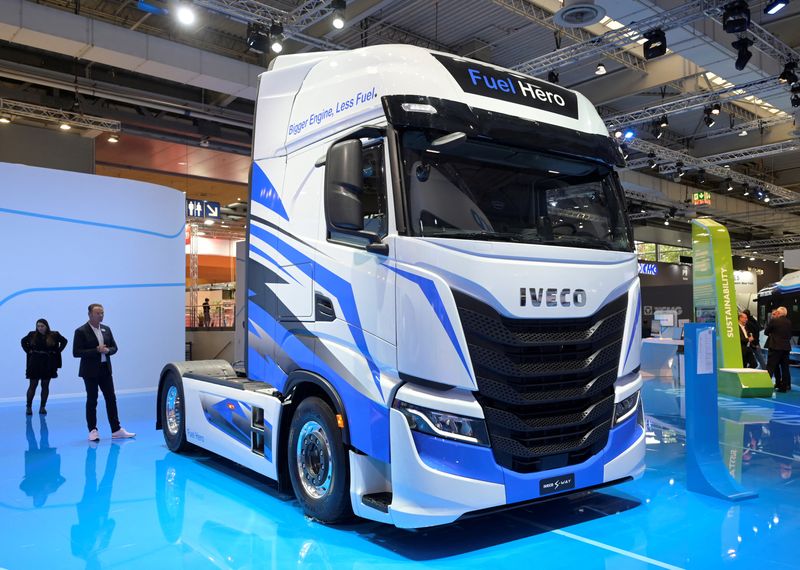 &copy; Reuters. FILE PHOTO: Members of the media stand behind an Iveco S-Way truck at the booth of truck-maker Iveco at the IAA Transportation fair, which will open its doors to the public on September 20, 2022, in Hanover, Germany, September 19, 2022. REUTERS/Fabian Bim