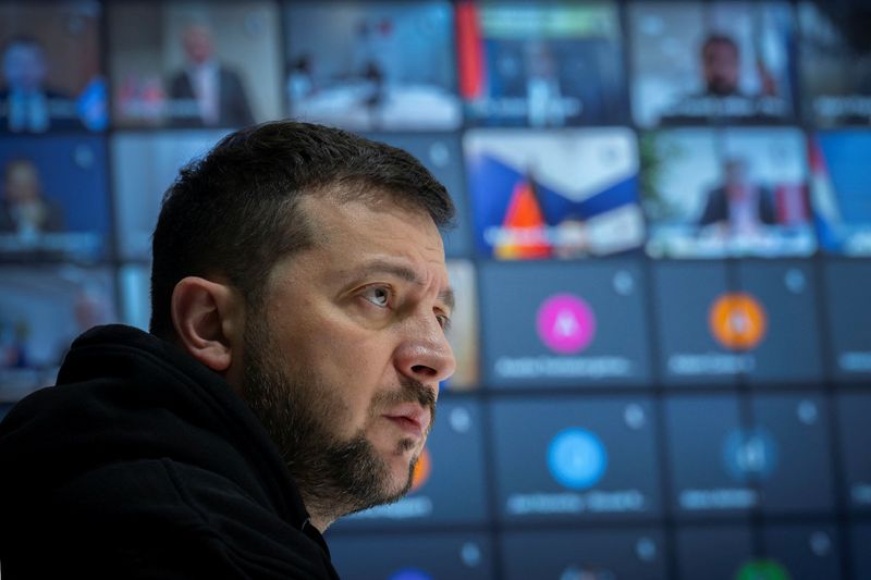 © Reuters. Ukraine's President Volodymyr Zelenskiy attends an online meeting with sport ministers of 35 countries to discuss a ban of Russian and Belarusian athletes from the 2024 Olympics, amid Russia's attack on Ukraine, in Kyiv, Ukraine February 10, 2023.  Ukrainian Presidential Press Service/Handout via REUTERS