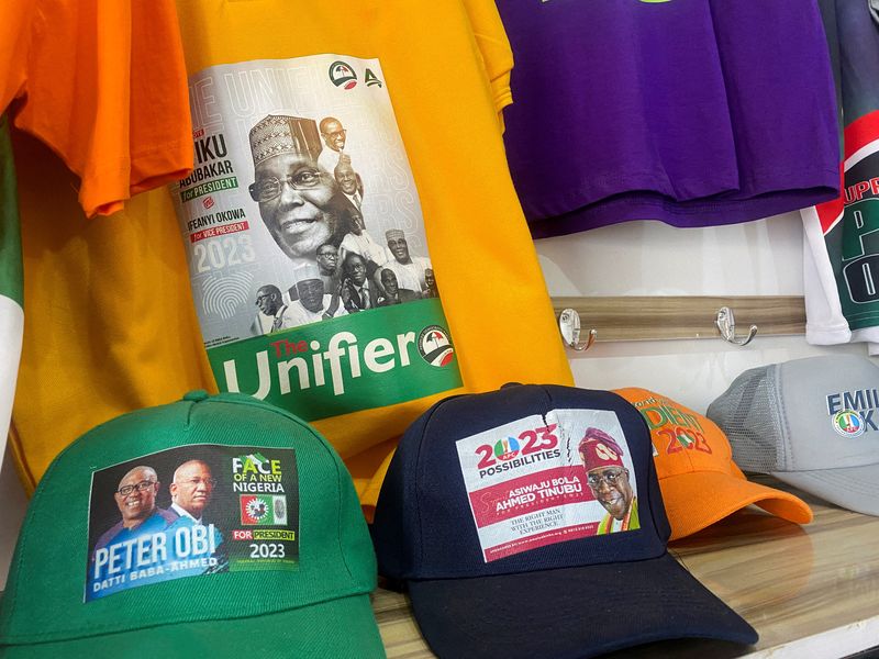 &copy; Reuters. FILE PHOTO: Branded T-shirts and baseball caps with images of Nigerian presidential candidates are displayed at a shopping center in Abuja, Nigeria February 2, 2023. REUTERS/Abraham Achirga/File Photo