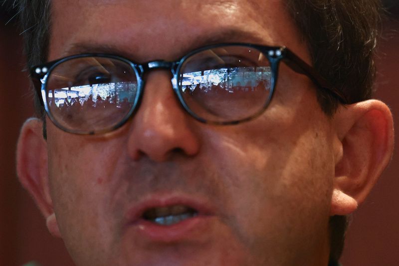 &copy; Reuters. FILE PHOTO: Journalists are seen reflected of the glasses of Pedro Stretch, child psychiatrist and head of the commission investigating allegations of historical child sexual abuse by members of the Portuguese Catholic church, during a news conference in 