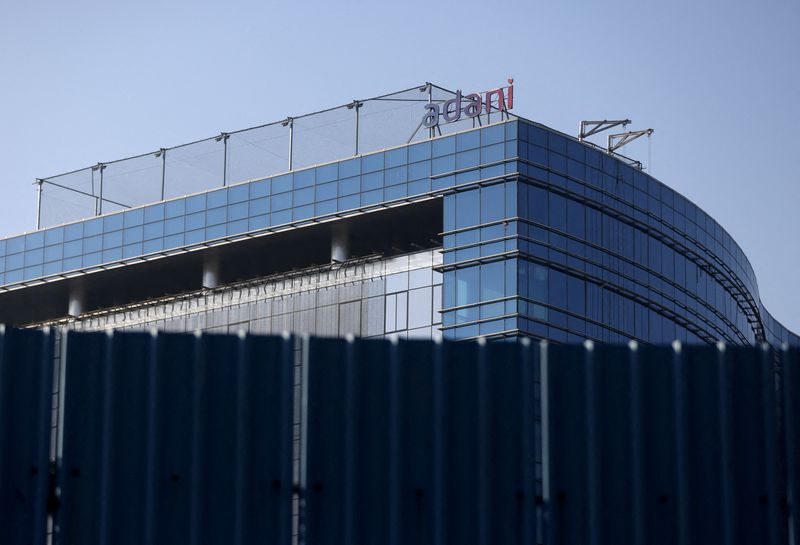 &copy; Reuters. FILE PHOTO: A logo of the Adani Group is seen on a commercial complex in Mumbai, India, February 7, 2023. REUTERS/Francis Mascarenhas