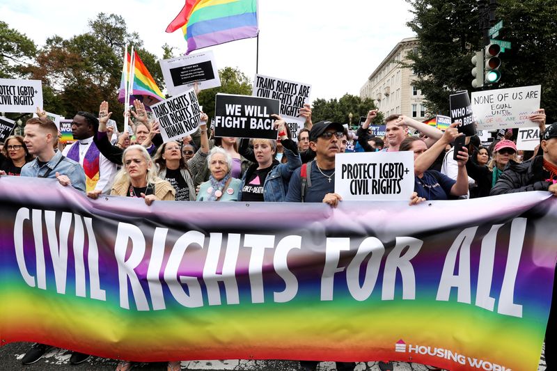 © Reuters. FILE PHOTO: LGBT activists and supporters block the street outside the U.S. Supreme Court in Washington, U.S. October 8, 2019.  REUTERS/Jonathan Ernst/File Photo/File Photo/File Photo