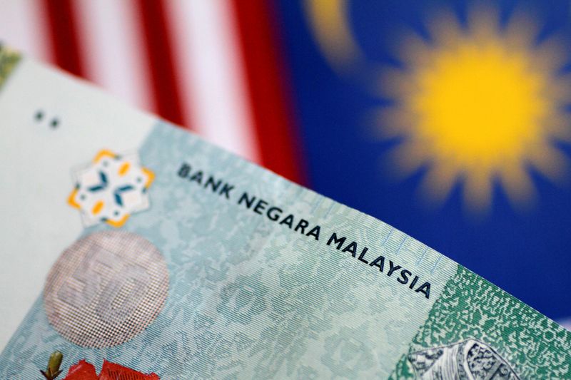 &copy; Reuters. A Malaysia Ringgit note is seen in this illustration photo June 1, 2017. REUTERS/Thomas White/Illustration/Files