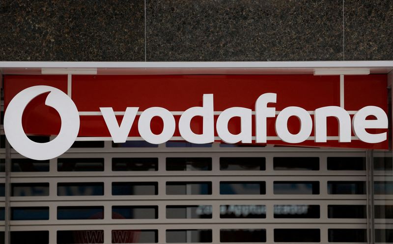 &copy; Reuters. FILE PHOTO: The logo of Vodafone is seen on the facade of a store in Ronda, Spain, October 3, 2022. REUTERS/Jon Nazca/File Photo