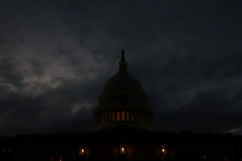 &copy; Reuters. FILE PHOTO: The sun sets behind the U.S. Capitol building after a stormy day in Washington, U.S., November 11, 2022. REUTERS/Leah Millis