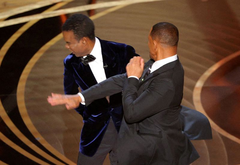 &copy; Reuters. Will Smith acerta tapa em Chris Rock na premiação do Oscar
27/03/2022
REUTERS/Brian Snyder