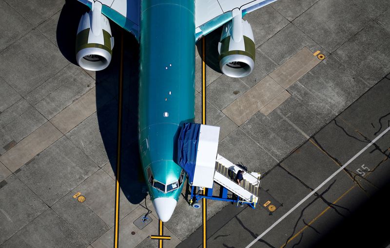 &copy; Reuters. FILE PHOTO: An unpainted Boeing 737 MAX aircraft is seen parked in an aerial photo at Renton Municipal Airport near the Boeing Renton facility in Renton, Washington, U.S. July 1, 2019.  REUTERS/Lindsey Wasson    