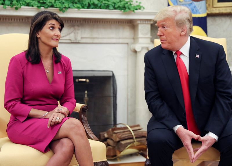 © Reuters. FILE PHOTO: U.S. President Donald Trump talks with U.N. Ambassador Nikki Haley in the Oval Office of the White House after it was announced the president had accepted the Haley's resignation in Washington, U.S., October 9, 2018. REUTERS/Jonathan Ernst/File Photo