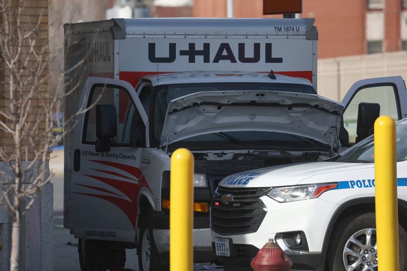 &copy; Reuters. A New York Police Department vehicle blocks a U-Haul rental vehicle, where according to media reports a man struck multiple people and the NYPD took the driver into custody, near the Battery tunnel in the Brooklyn borough of New York City, U.S., February 