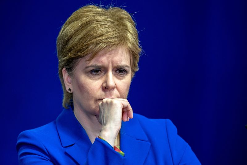 &copy; Reuters. FILE PHOTO: First Minister of Scotland Nicola Sturgeon reacts as she answers questions on Scottish Government issues, during a news conference at St Andrews House, in Edinburgh, Britain February 6, 2023. Jane Barlow/Pool via REUTERS/File Photo