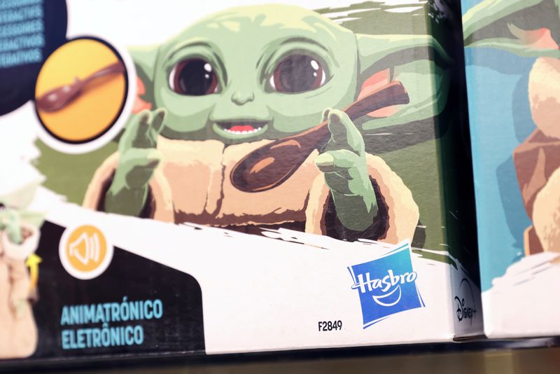 &copy; Reuters. FILE PHOTO: The Hasbro, Inc. logo is seen on the Star Wars Galactic Snackin Grogu toy in the FAO Schwarz toy store in Manhattan, New York City, U.S., November 24, 2021. REUTERS/Andrew Kelly