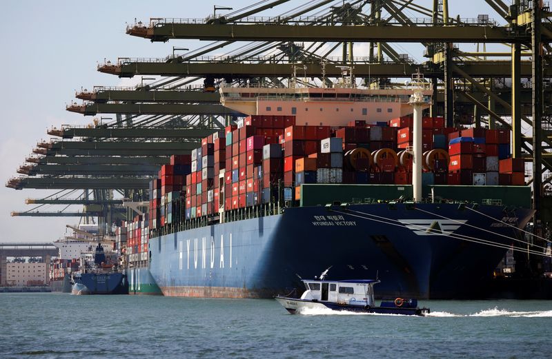 &copy; Reuters. FILE PHOTO-Container ships are berthed at PSA's Pasir Panjang Terminal in Singapore July 15, 2019.  Picture taken July 15, 2019.  REUTERS/Edgar Su