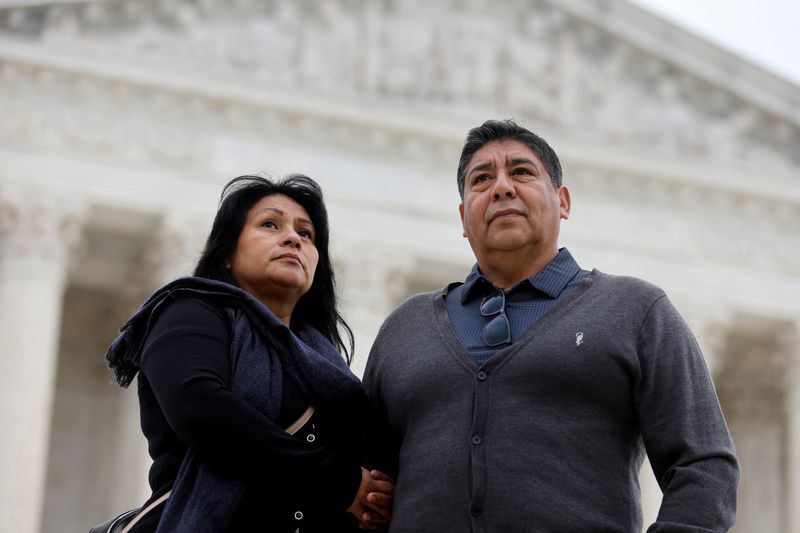 © Reuters. FILE PHOTO: Beatrice Gonzalez and Jose Hernandez, the mother and stepfather of Nohemi Gonzalez, who was fatally shot and killed in a 2015 rampage by Islamist militants in Paris, pose for a portrait outside the U.S. Supreme Court in Washington, U.S., February 16, 2023, days before justices are scheduled hear arguments in Gonzalez v. Google, challenging federal protections for internet and social media companies freeing them of responsibility for content posted by users in a case involving social media giant Google and its subsidiary YouTube, whom they argue bear some responsibility for their daughter’s death. REUTERS/Jonathan Ernst