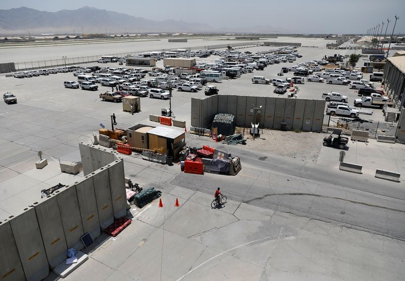 &copy; Reuters. FILE PHOTO: Parked vehicles are seen in Bagram U.S. air base, after American troops vacated it, in Parwan province, Afghanistan July 5, 2021. REUTERS/Mohammad Ismail