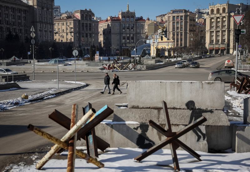 Toughened by war's scars, Kyiv presses on while Russia attacks