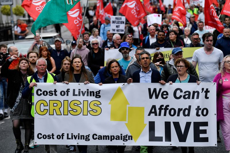 &copy; Reuters. FILE PHOTO: Sinn Fein leader Mary Lou McDonald walks with a group of people holding a banner as they protest about the rising cost of living, in the city centre of Dublin, Ireland, June 18, 2022. REUTERS/Clodagh Kilcoyne